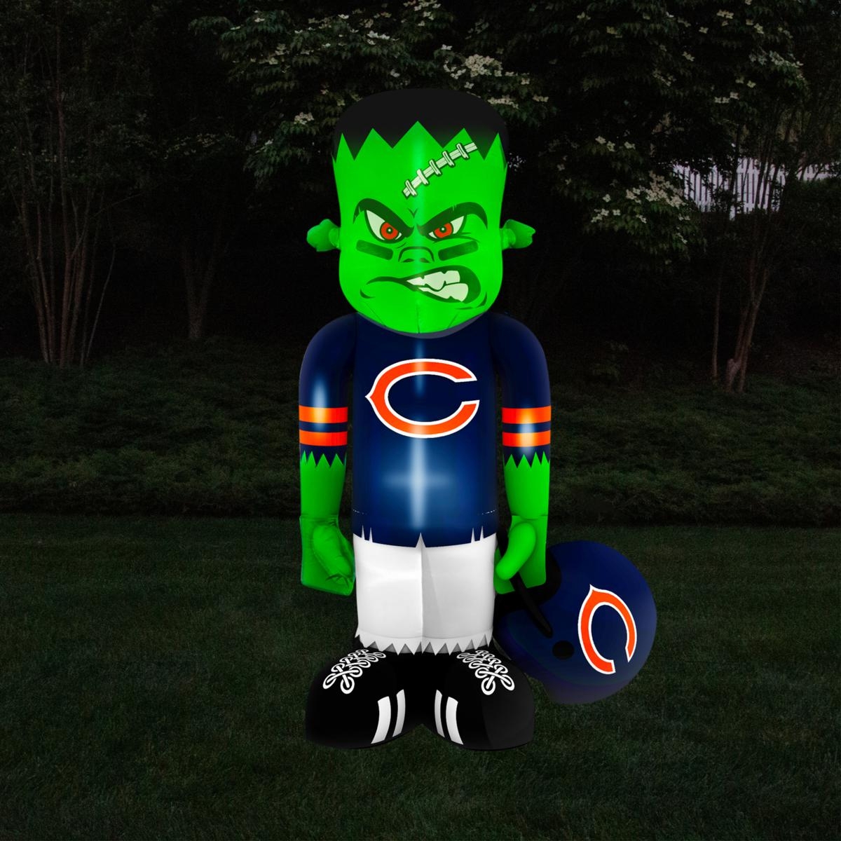 An inflatable figure combines the characteristics of the Hulk with the uniform of the Chicago Bears NFL team; it's holding a matching football helmet.