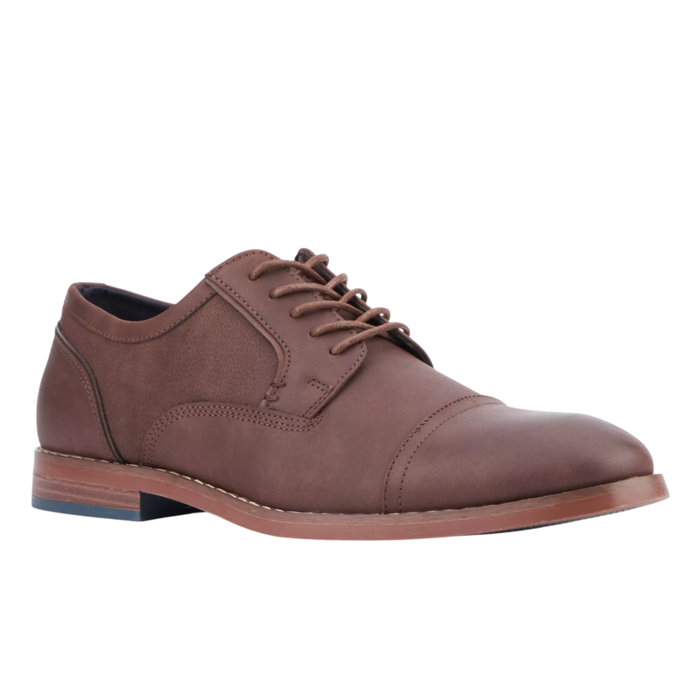 A brown leather dress shoe with laces and a cap toe design, featuring a low stacked heel and visible stitching along the edges.