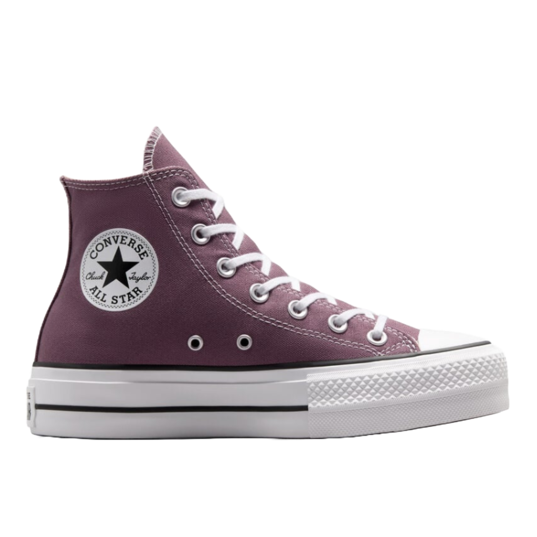Chuck Taylor All Star Lift Platform Shoes feature a high-top design, purple canvas upper, white laces, and a thick white platform sole with black stripe detailing.