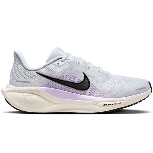 Nike running shoe with a lavender and white color scheme, featuring a black swoosh and \“Air Zoom\“ technology.