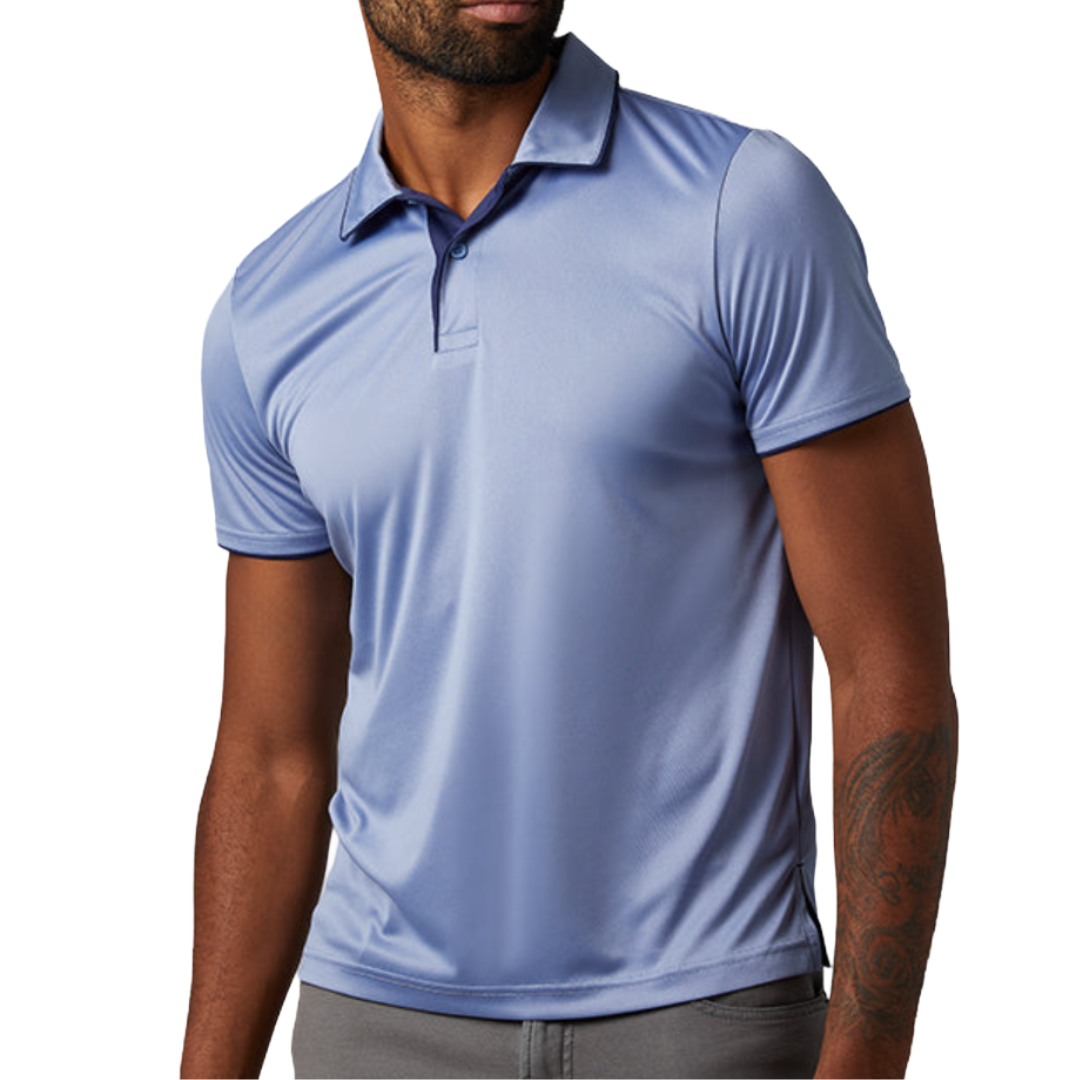 A man wearing a light blue polo shirt with a collar and buttons, paired with gray pants.