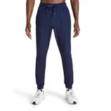 Navy blue jogger pants with a drawstring waist, worn by a person paired with white sneakers.