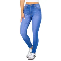 Mid-rise, blue wash skinny ankle jeans with a fitted style, five-pocket design, and button closure. Paired with casual sneakers.