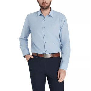 A man is wearing a light blue button-up shirt with long sleeves, paired with dark trousers and a brown belt.