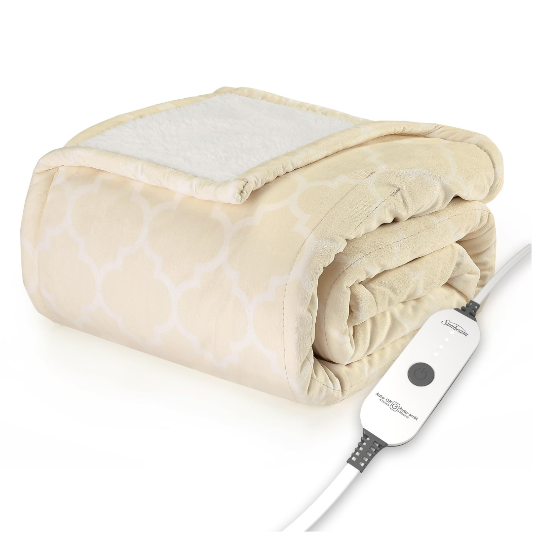 A beige patterned electric blanket with a white lining and an attached control unit for adjusting heat settings.