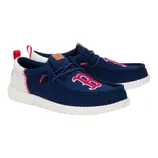 Navy blue slip-on shoes featuring a red and white logo on the toe, complemented by white soles and red accents.