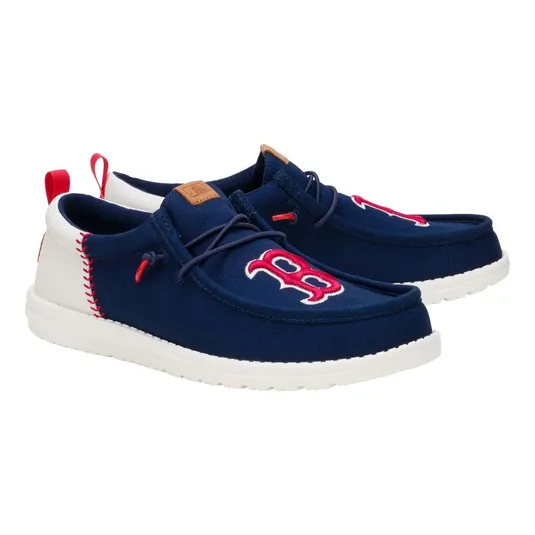 Navy blue slip-on shoes featuring a red and white logo on the toe, complemented by white soles and red accents.