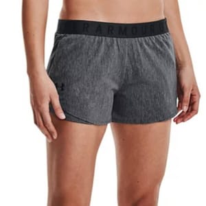 Under Armour Play Up Shorts are lightweight, heathered gray athletic shorts with a black elastic waistband featuring the brand name. Suitable for workouts, they offer a comfortable fit and simple design.