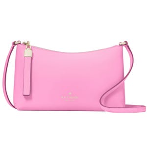 A pink Kate Spade New York crossbody bag with a simple shape, gold-tone hardware, and an adjustable strap.