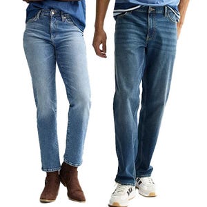 Two pairs of jeans; one light-wash straight-leg on the left with brown boots, and one medium-wash straight-leg on the right with white sneakers.