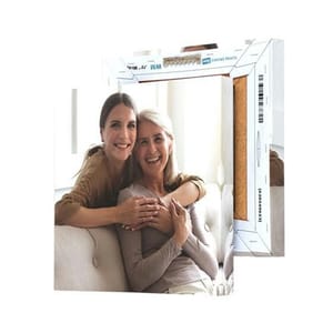 Canvas print featuring a photo of two women smiling and embracing, presented with a focus on the print's wrapped edge design.