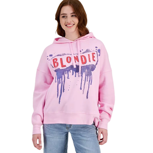 Pink hoodie with \“BLONDIE\“ in bold red letters and a blue paint splatter design; features long sleeves, a hood with drawstrings, and a relaxed fit, paired with light blue jeans.