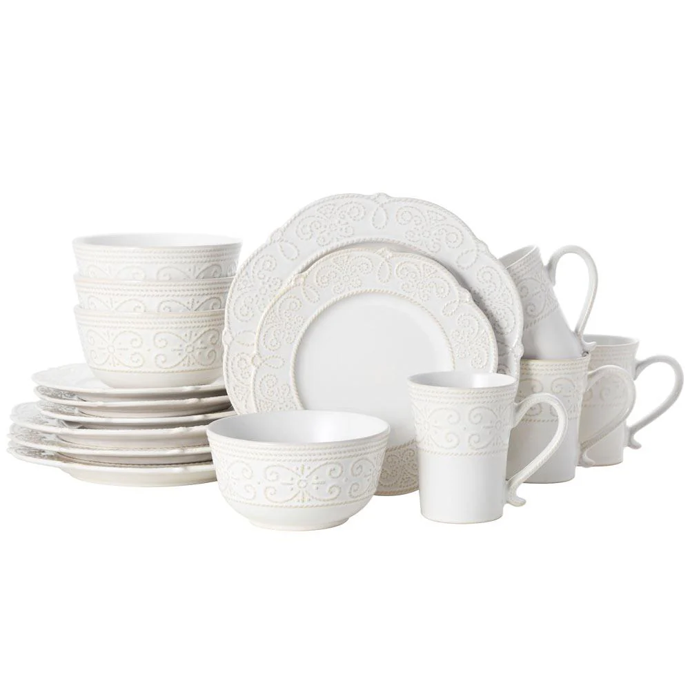 A 16-piece Pfaltzgraff Dinnerware Set featuring a white ceramic design with intricate embossed patterns, including four each of dinner plates, salad plates, bowls, and mugs.
