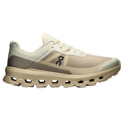A beige and cream athletic shoe with a unique sole design featuring multiple open segments. The shoe displays a logo on the side and has lace-up fastening.