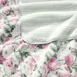 Floral-patterned fabric with pink roses, featuring a soft gray and white lining, labeled \“Laura Ashley Since 1953.\“