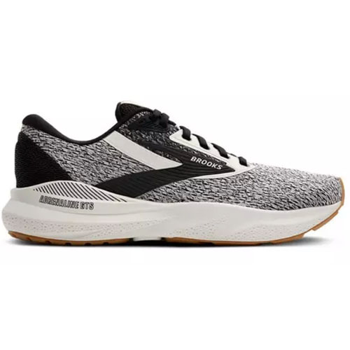 Brooks Adrenaline GTS running shoe in black and white with a textured upper, featuring a cushioned sole and gum outsole.