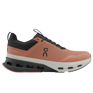 A coral-colored athletic shoe with black and white accents featuring a cushioned sole and a logo on the side.