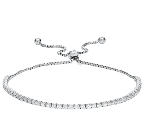 A silver adjustable bracelet with a thin band of small, clear gemstones, featuring a sliding ball clasp and two end beads for easy size adjustment.