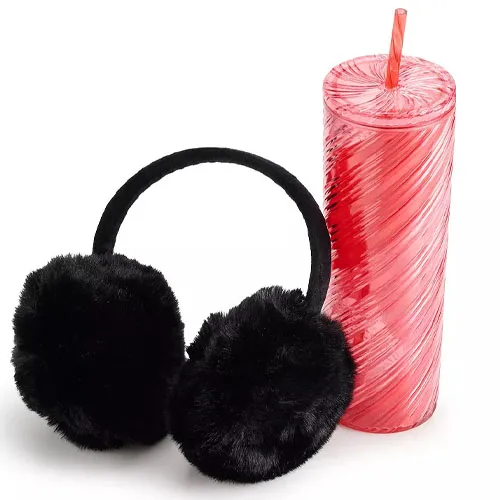 Black faux fur earmuffs and a red swirl-patterned tumbler with a straw.