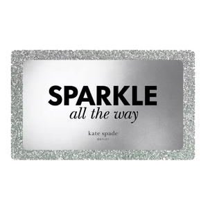 Silver and glittery card with the phrase \“SPARKLE all the way\“ and \“kate spade outlet\“ in smaller text.