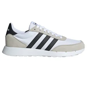 White and beige Adidas sneaker with black stripes on the side.