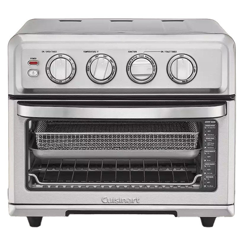 Cuisinart air fryer toaster oven with adjustable knobs for power, timer, temperature, function, and toast settings. Includes an air fry basket and a drip tray.