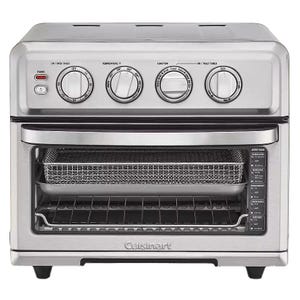 Cuisinart air fryer toaster oven with adjustable knobs for power, timer, temperature, function, and toast settings. Includes an air fry basket and a drip tray.