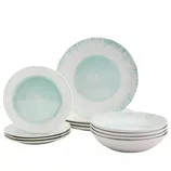 A set of dinnerware featuring plates and bowls with a white and light turquoise design, having a textured center and radial lines on the edges.