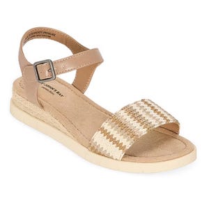A tan wedge sandal with an ankle strap, a metallic buckle, and a woven zigzag pattern on the front strap.