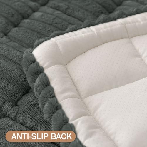 Quilted grey pet bed mat with a white, anti-slip backing, designed to prevent sliding on surfaces.