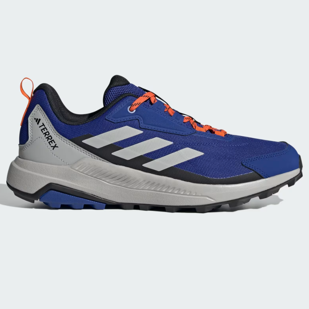 Blue and gray Adidas Terrex Anylander hiking shoes feature orange laces, three white stripes, and a rugged sole design.