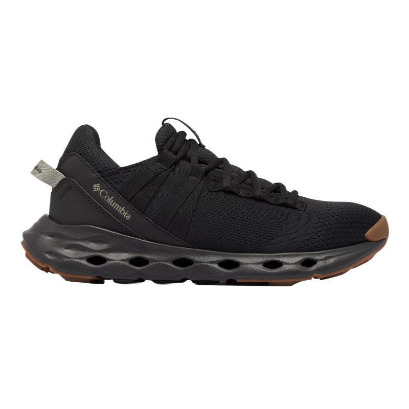 Columbia Terrastride ARO Shoes feature a breathable black knit upper, cushioned midsole with cutout design, rubber outsole for grip, and brown toe and sole accents. Suitable for hiking or outdoor activities.
