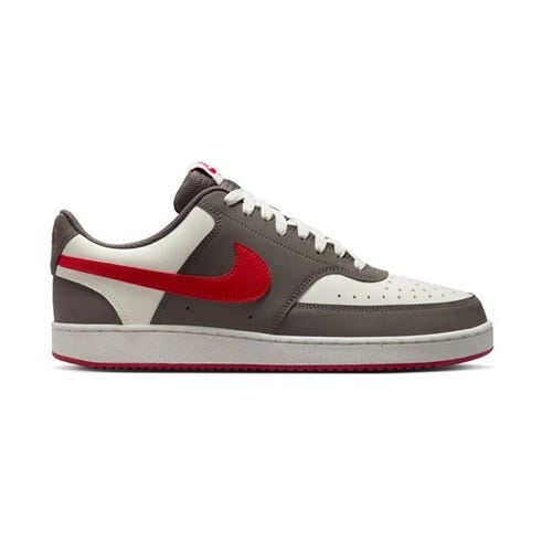 Nike sneaker with a red swoosh, dark gray and white panels, and red accents on the sole.