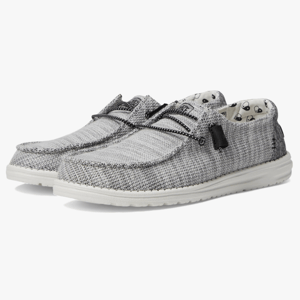 Casual knit sneakers with a lace-up design and white soles.