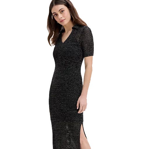 A woman wearing a textured black knit dress with short sleeves, a V-neck, and a side slit.