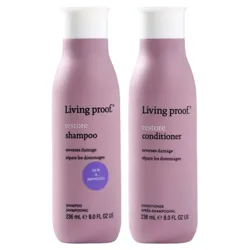 Living Proof Restore Shampoo and Conditioner, each with 236 ml (8.0 fl oz), designed to reverse damage and repair hair.