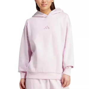 A light pink Adidas hoodie with a small logo on the chest is shown, worn with matching sweatpants.