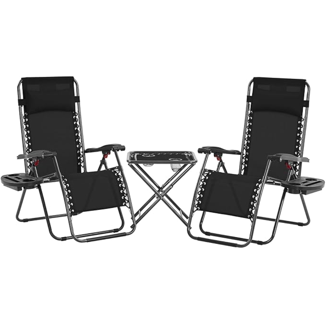 A set featuring two black zero gravity chairs with adjustable headrests and side tray tables, accompanied by a small folding table. The chairs have a metal frame and a bungee-cord support system, designed for outdoor relaxation.