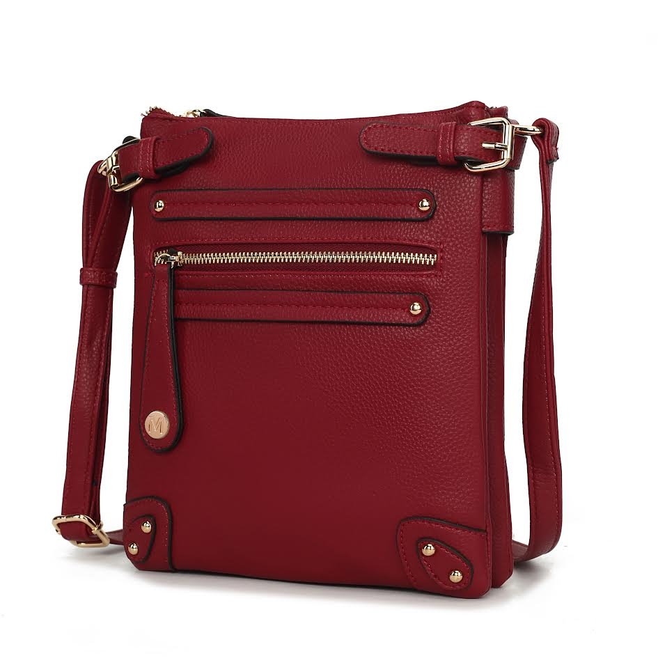 Red leather crossbody bag with gold-tone hardware, featuring multiple front zip and slip pockets, adjustable shoulder strap, and a square shape.