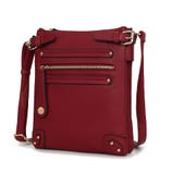 Red leather crossbody bag with gold-tone hardware, featuring multiple front zip and slip pockets, adjustable shoulder strap, and a square shape.