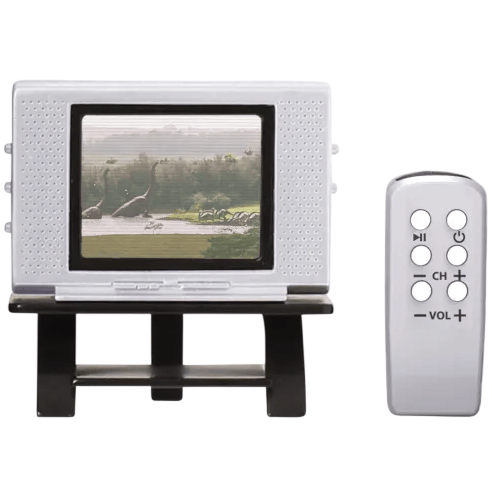 A miniature retro-style television set with a small screen showing dinosaurs, accompanied by a remote control with buttons for play, channel, and volume.