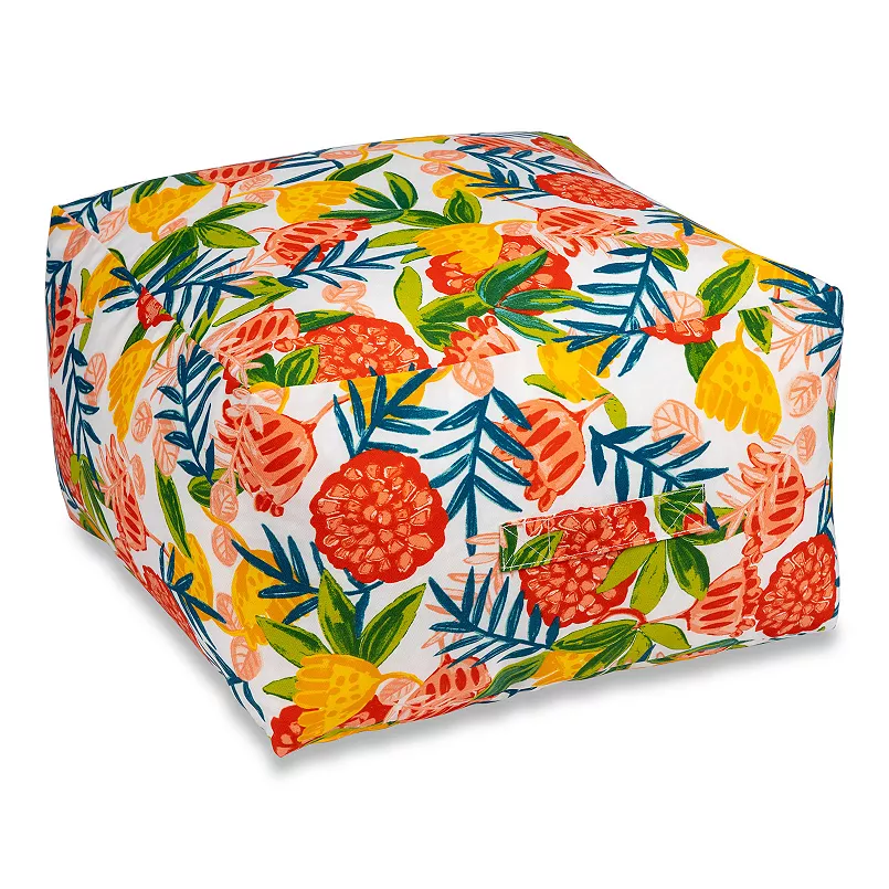 Brightly colored tropical-patterned bean bag with pineapple and floral designs.