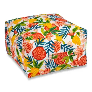 Brightly colored tropical-patterned bean bag with pineapple and floral designs.