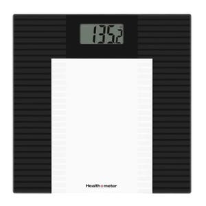 Digital bathroom scale with a black and white design, displaying a weight of 135.2 pounds.