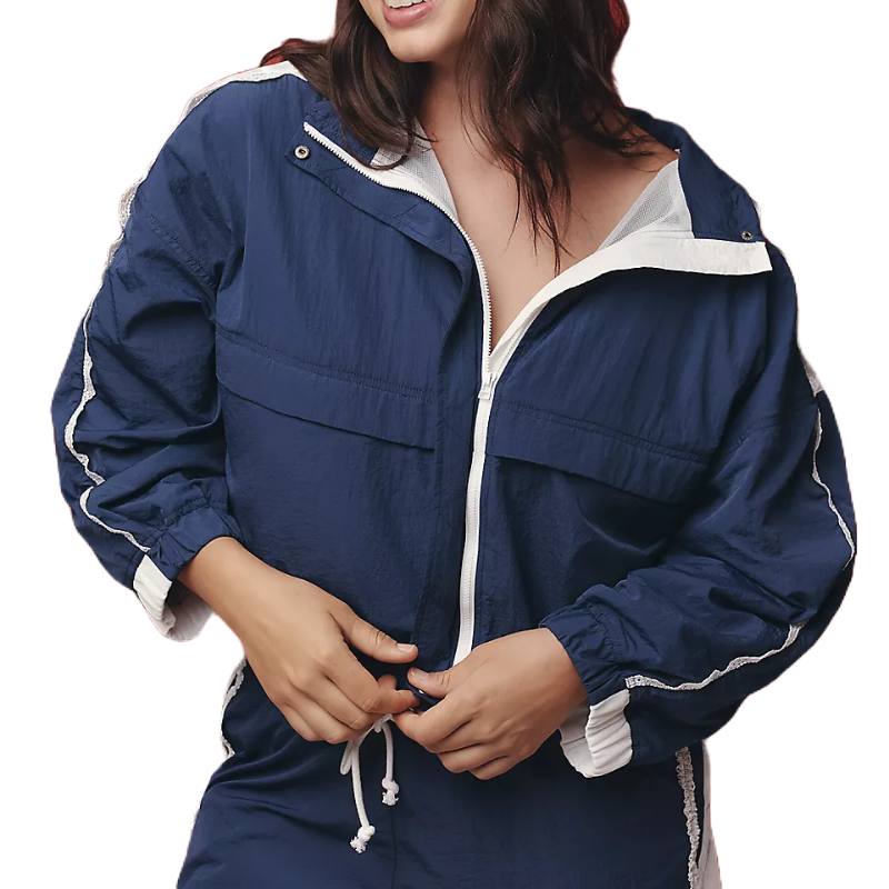 A navy blue zip-up windbreaker with white trim and drawstring, featuring a loose fit and elastic cuffs.