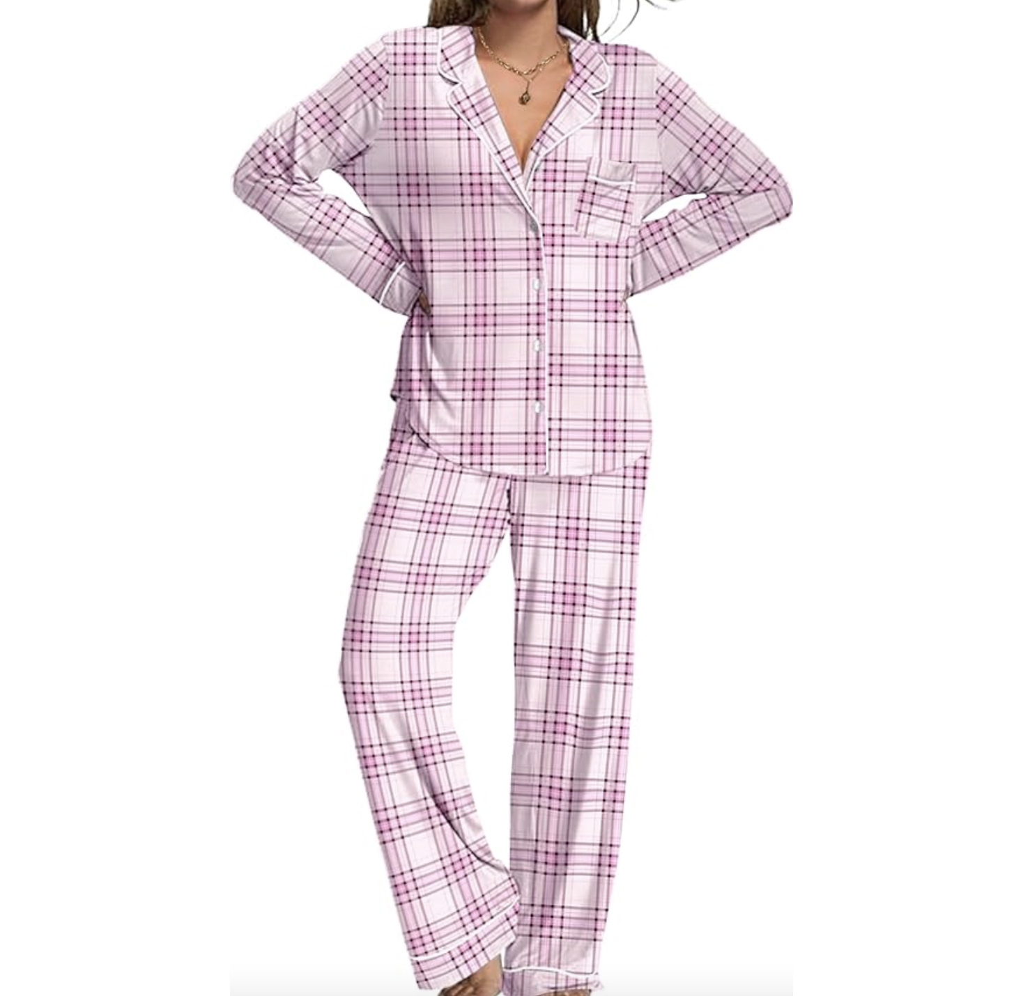 Women's pink and white plaid pajamas with a long-sleeve button-up top featuring a chest pocket, and matching pants.