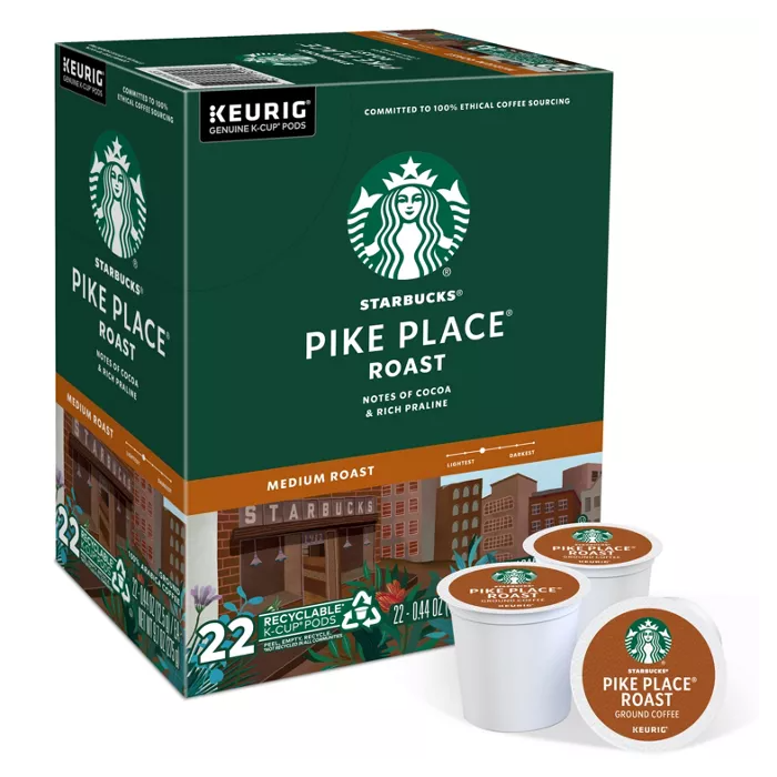 Starbucks Pike Place Roast medium roast K-Cup pods, featuring notes of cocoa and rich praline. The box contains 22 recyclable pods, compatible with Keurig machines.