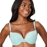 A woman wearing a light blue lace bra with adjustable straps.