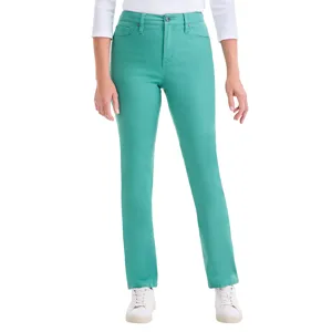 Teal straight-leg jeans paired with a white long-sleeve top and white sneakers.