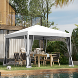 Outdoor gazebo with a white canopy and mesh curtains, set up next to a pool. It features a wooden dining table and chairs underneath, with trees and modern architecture in the background.